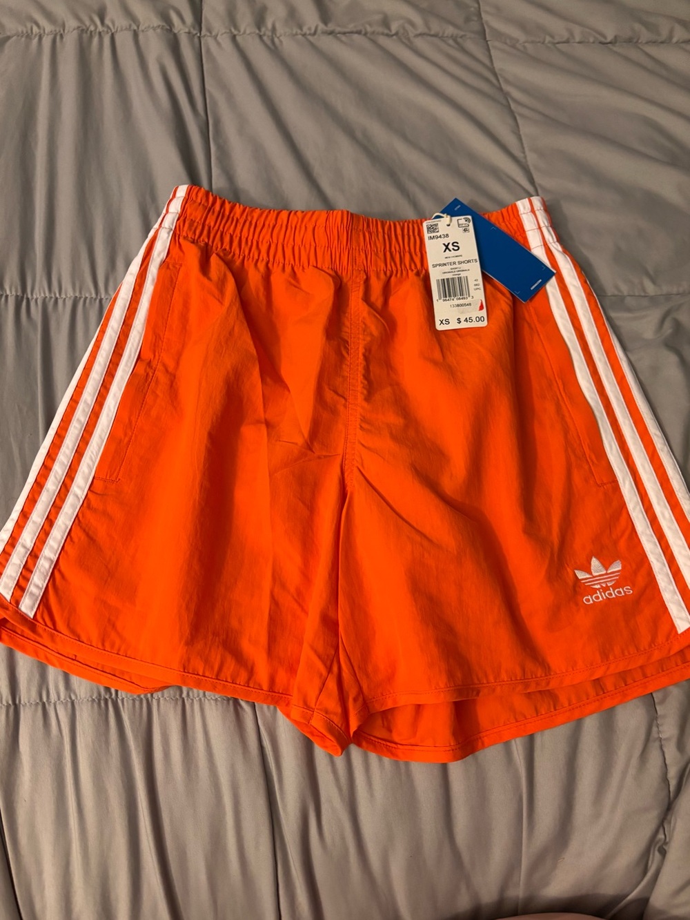 Adidas Orange Sprinter Shorts with White Stripes - XS